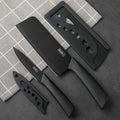 Kitchen knife set, including cleaver, chef's knife, and fruit knife